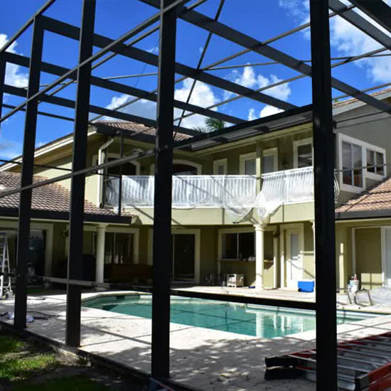 A pool that is in the middle of a house.