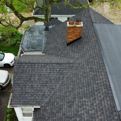 A car parked on the side of a house.