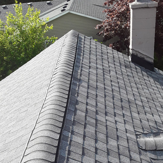 A roof with many different types of shingles.