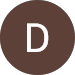 A brown circle with the letter d in it.