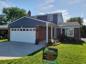 Pacific blue vinyl siding installation