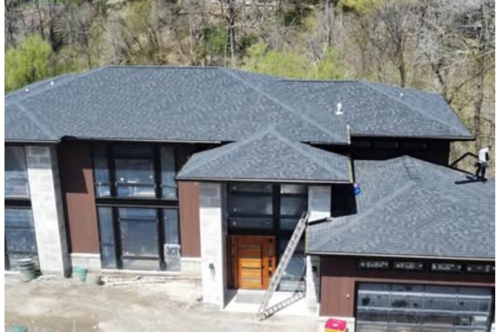 Seamless gutter machine onsite in troy mi driveway