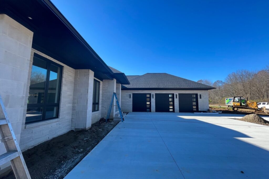 Modern house under construction with clear sky