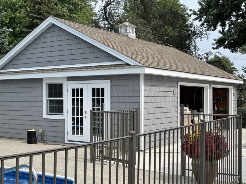 3G Home Exteriors siding crew working on a home exterior in Huntington Woods Michigan