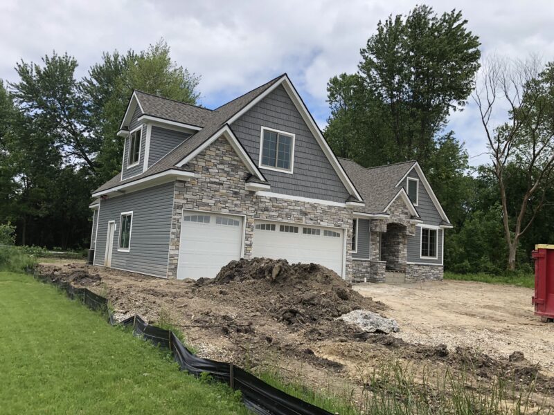 3G Home Exteriors siding crew working on a home exterior in Clarkston Michigan