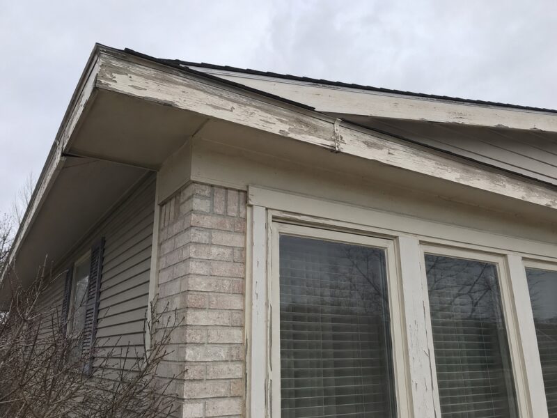 Peeling fascia and exterior trim before painting prep