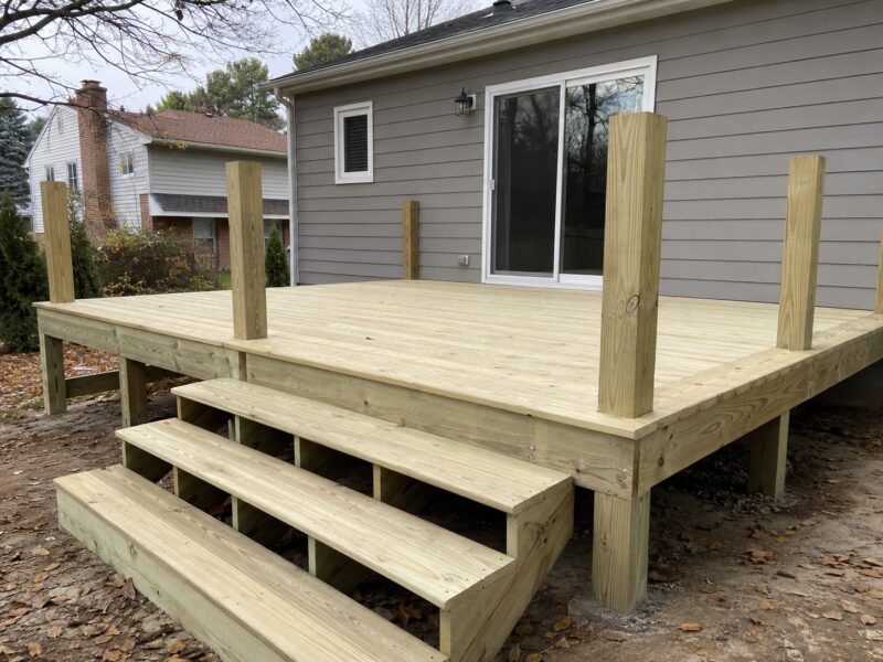 Pressure-treated wood deck construction planning by 3G Home Exteriors