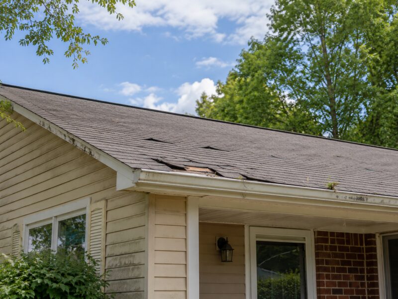 Aged Michigan roof before replacement by 3G Home Exteriors