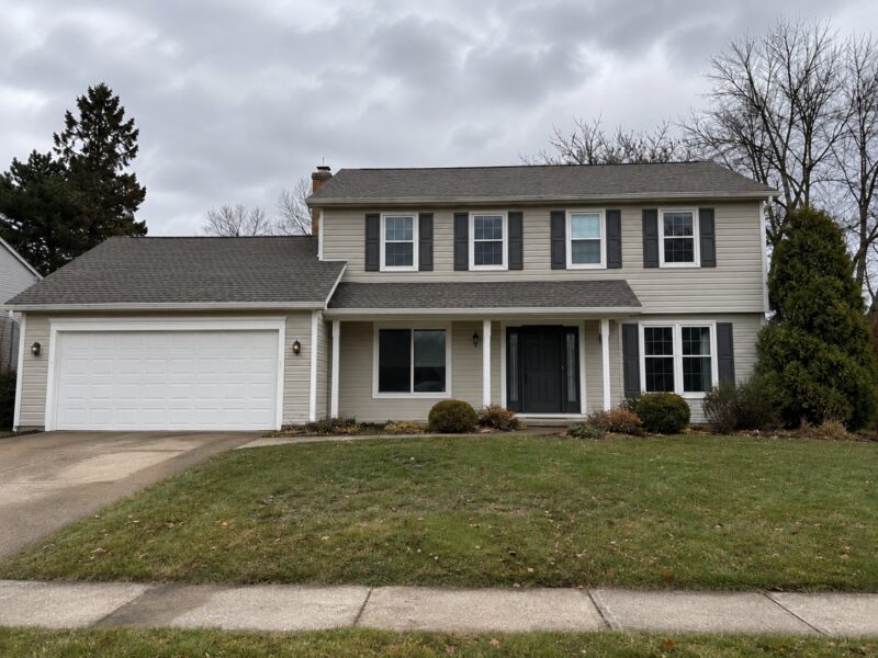 Freshly painted home exterior with coordinated siding and trim color by 3G Home Exteriors