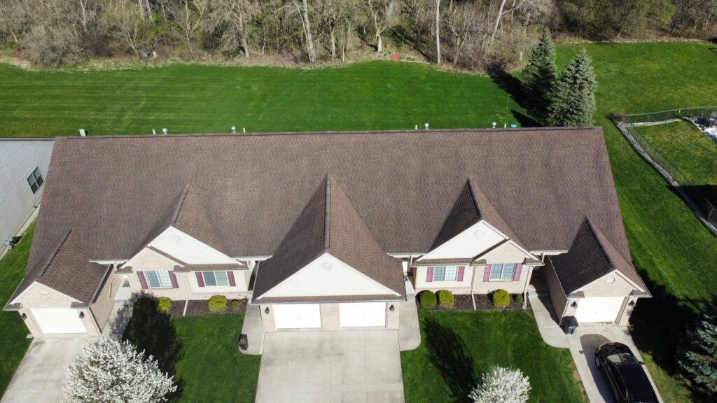 Aerial view home before roof replacement