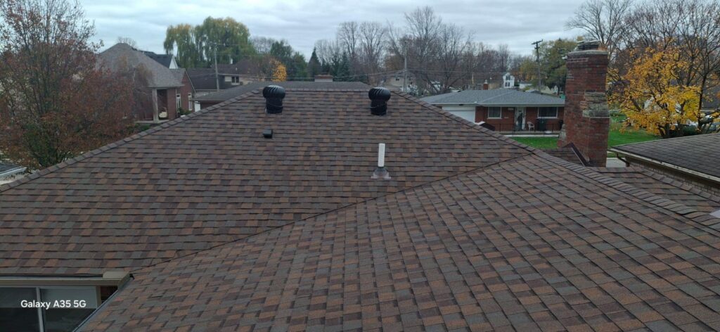 Aging brown roof before replacement