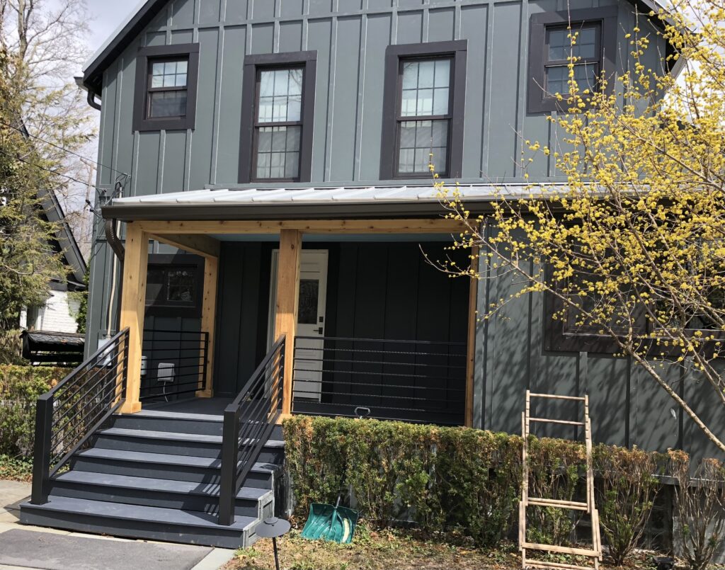 Dark james hardie board and batten siding