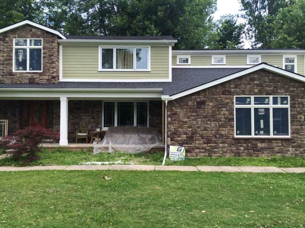Front exterior of a residential home prepared for a James Hardie siding project