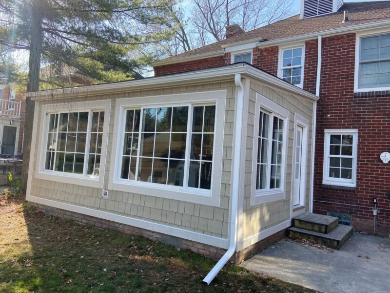 New vinyl siding and gutter system home exterior renovation