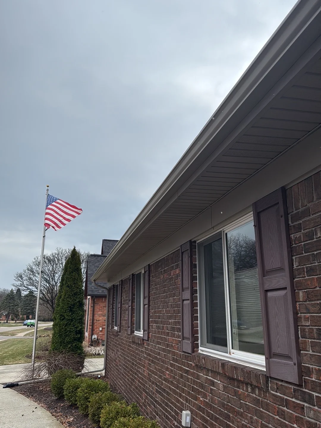 Seamless gutter installation on a Metro Detroit home