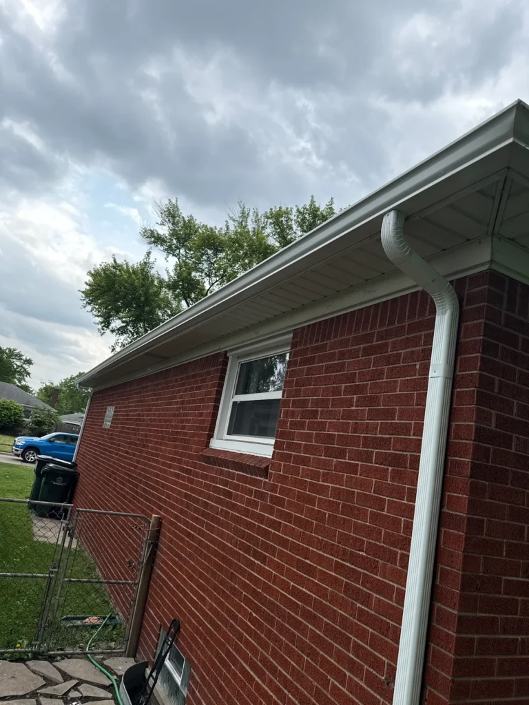 New seamless gutter installation on a Metro Detroit home