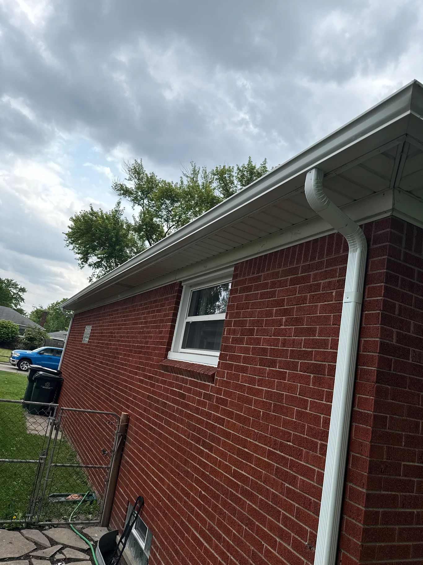 New seamless gutter installation on a Metro Detroit home