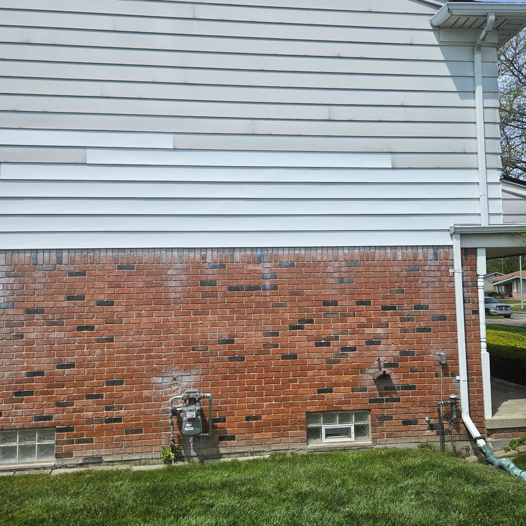 Wind damaged siding repaired on a Metro Detroit home